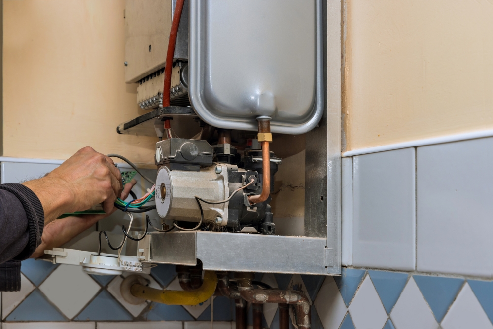 Gas vs. Electric Hot Water Heater Repairs » Hot Water Heater Repair Pros and Cons of Repairing a Gas Hot Water Heater